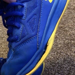 Size 12 blue/yellow under armour shoes